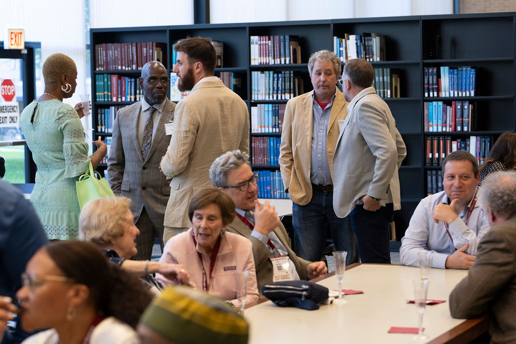 Groups of people chatting and mingling