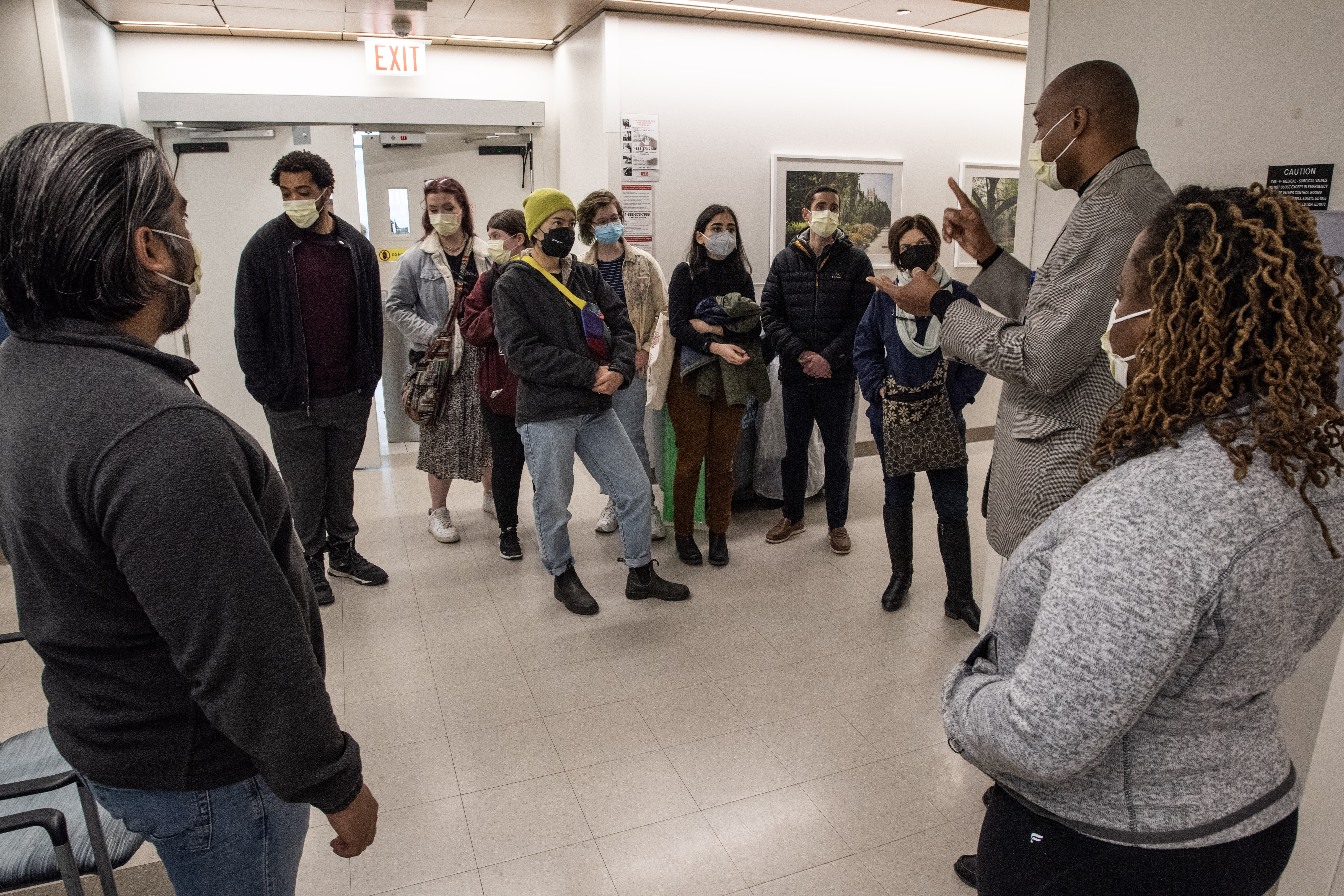 A group of people standing in a trauma center 