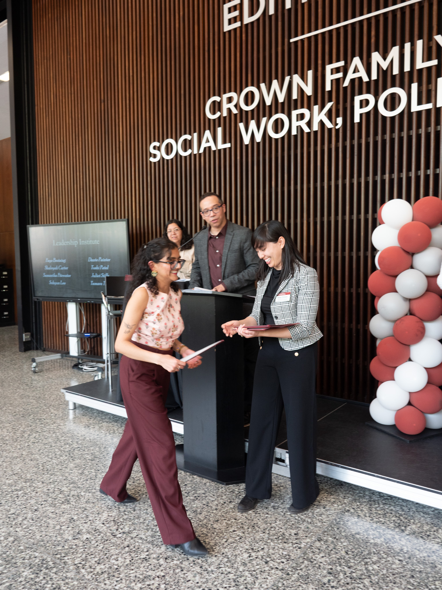 Student accepting an award walking away