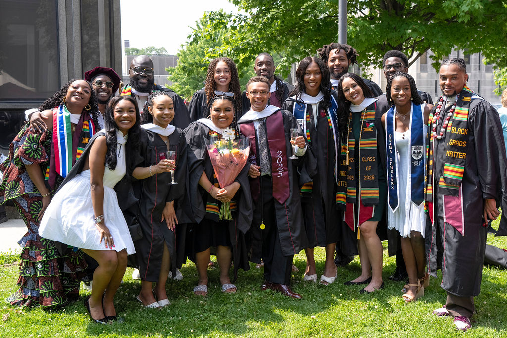 a group of graduates celebrate together