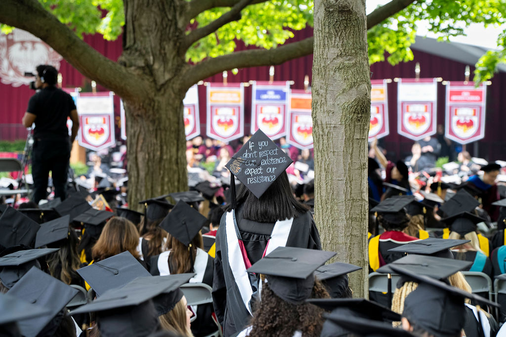 Graduates sitting in a crowd