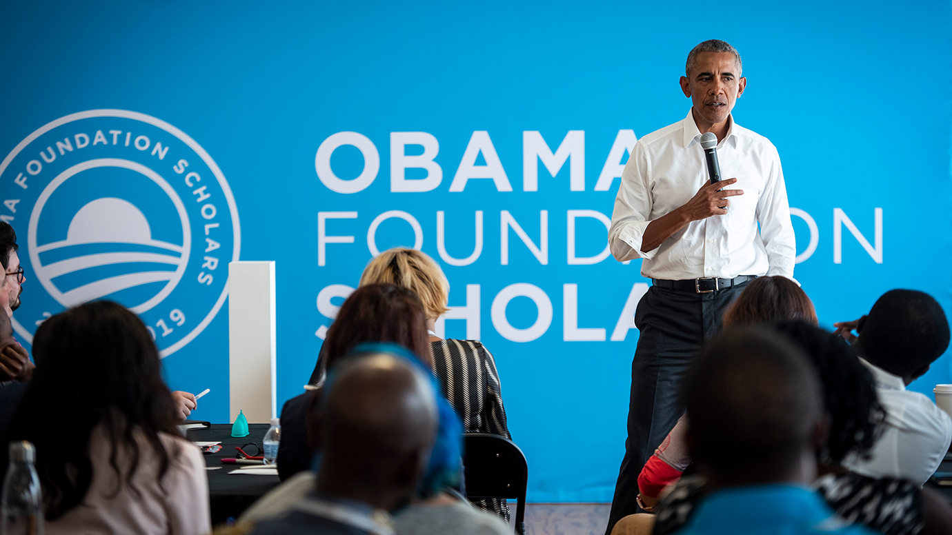 President Barack Obama talks with the inaugural class of Obama Scholars in 2018 in Chicago.