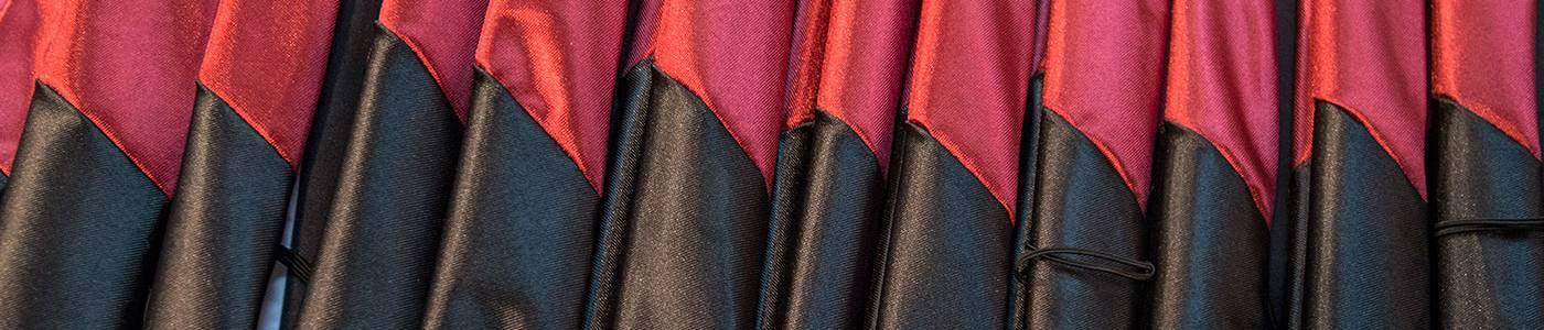 Black and red graduation robes
