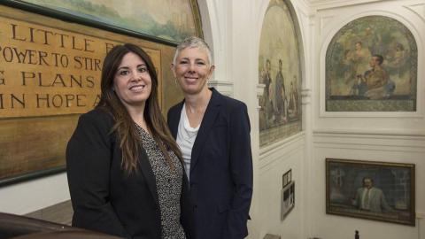 Sarah Duncan, co-executive director of the Network for College Success (right) with Dawn Ramos, principal of Tilden Career Community Academy High School in the Canaryville neighborhood of Chicago. Photo by Lloyd DeGrane