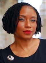 woman in black with red lip stick